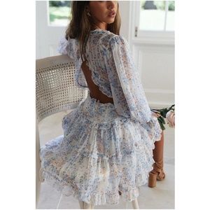 boho floral White V neck open back ruffle dress